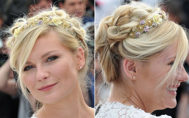 A trança pode ser usada com um recurso para dar textura ao cabelo, como neste penteado com flores da atriz Kirsten Dunst