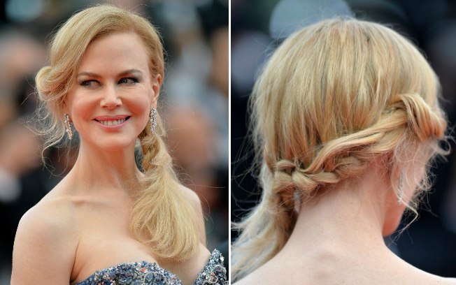 O penteado de Nicole Kidman envolve uma trança embutida que começa na lateral da franja e segue trançando até se tornar um rabo de cavalo 